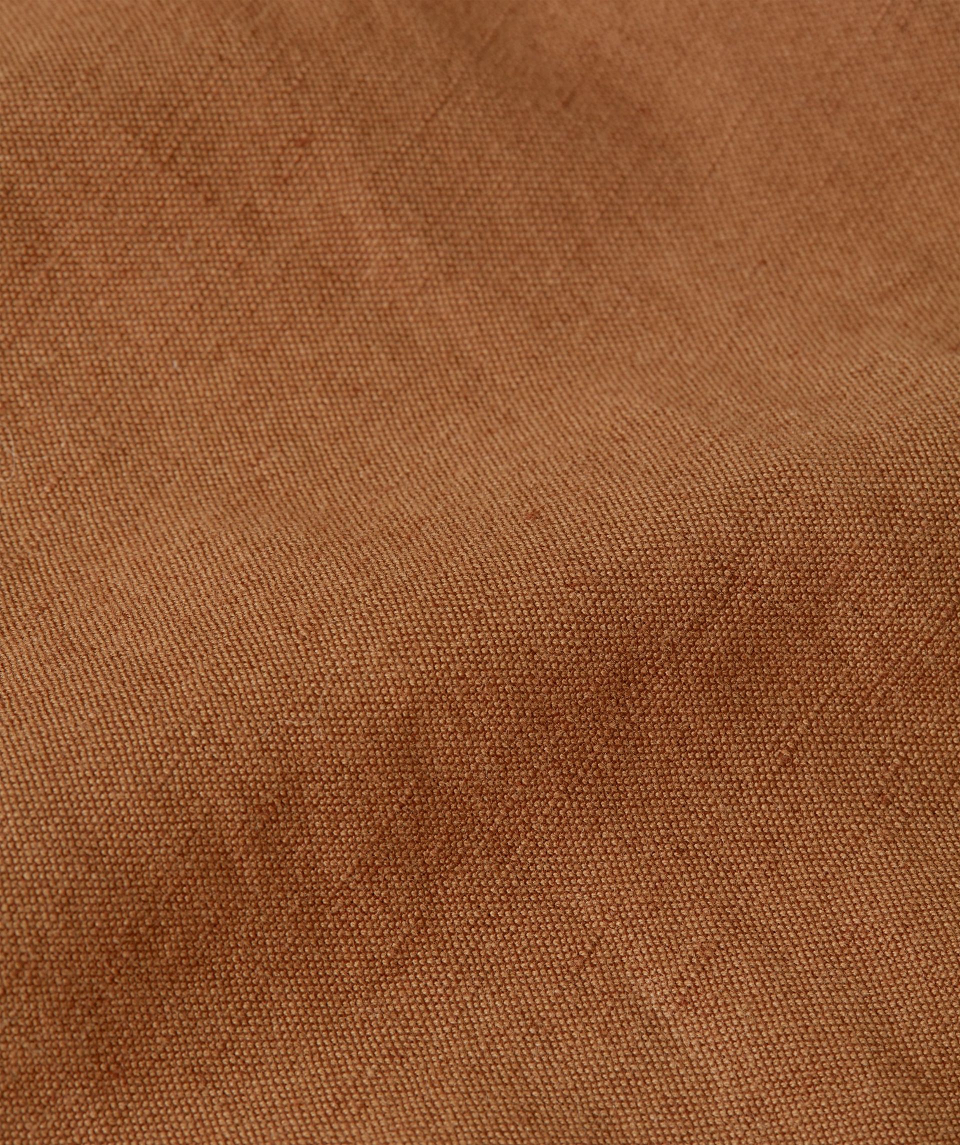 Close-up van de donkerbruine stof.