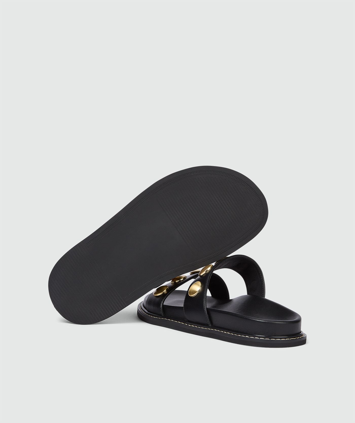 Sandalen met studs in de kleur Black, zonder model, weergegeven op een lichtgrijze achtergrond