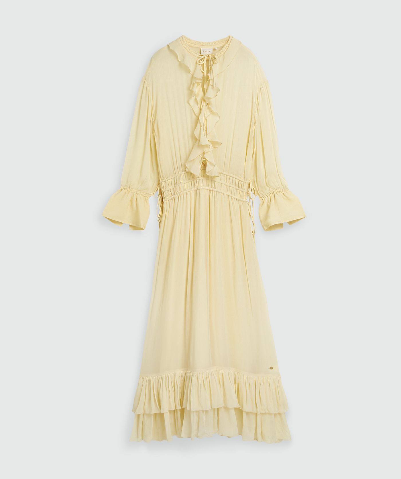 Een oversized maxi jurk in de kleur Butter Yellow, zonder model, weergegeven op een lichtgrijze achtergrond