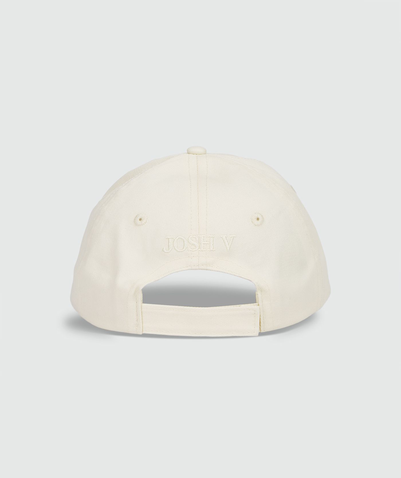 Achterzijde van een Off White pet met zwart JV embleem 