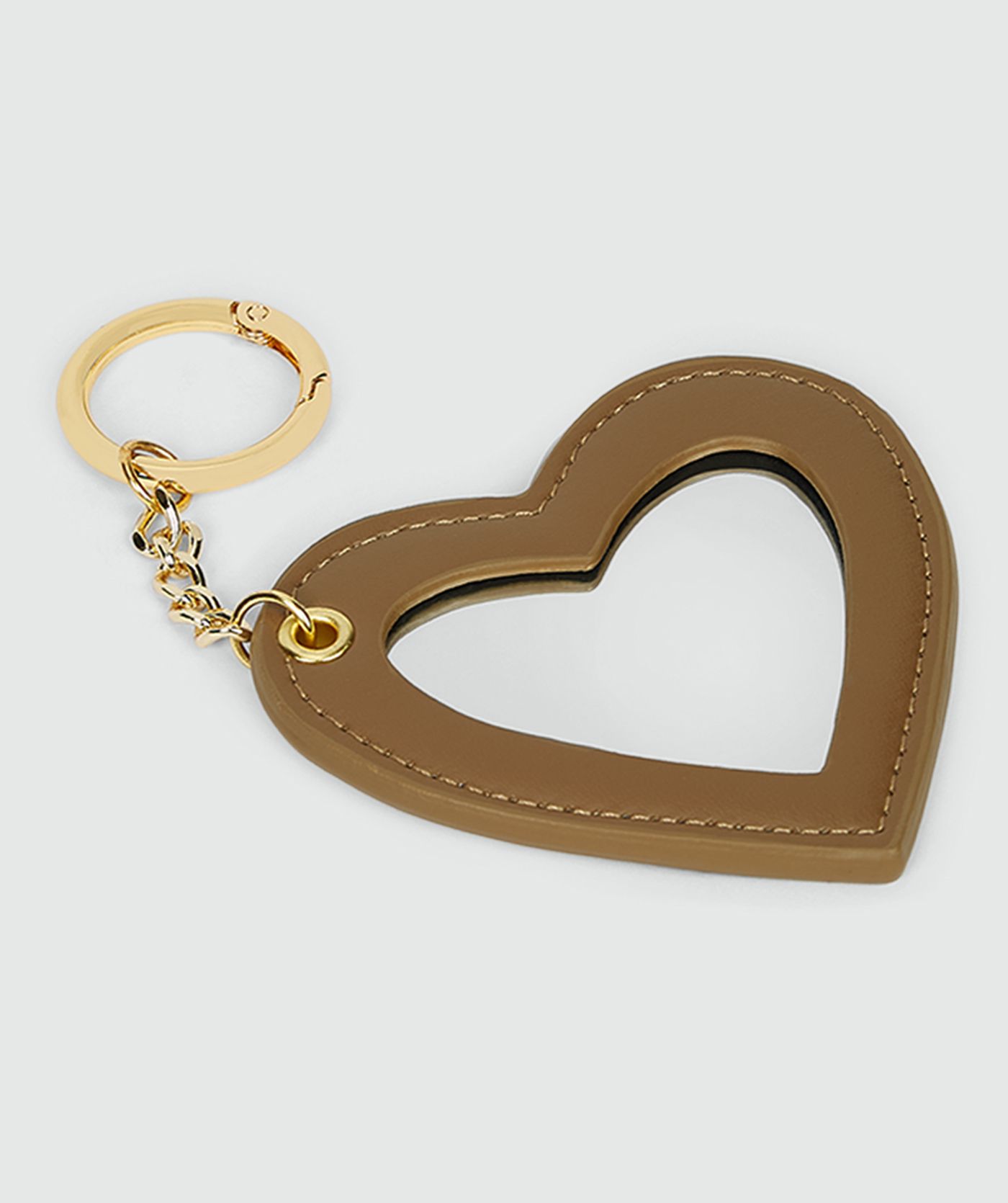 Voorzijde sleutelhanger met spiegel in het bruin