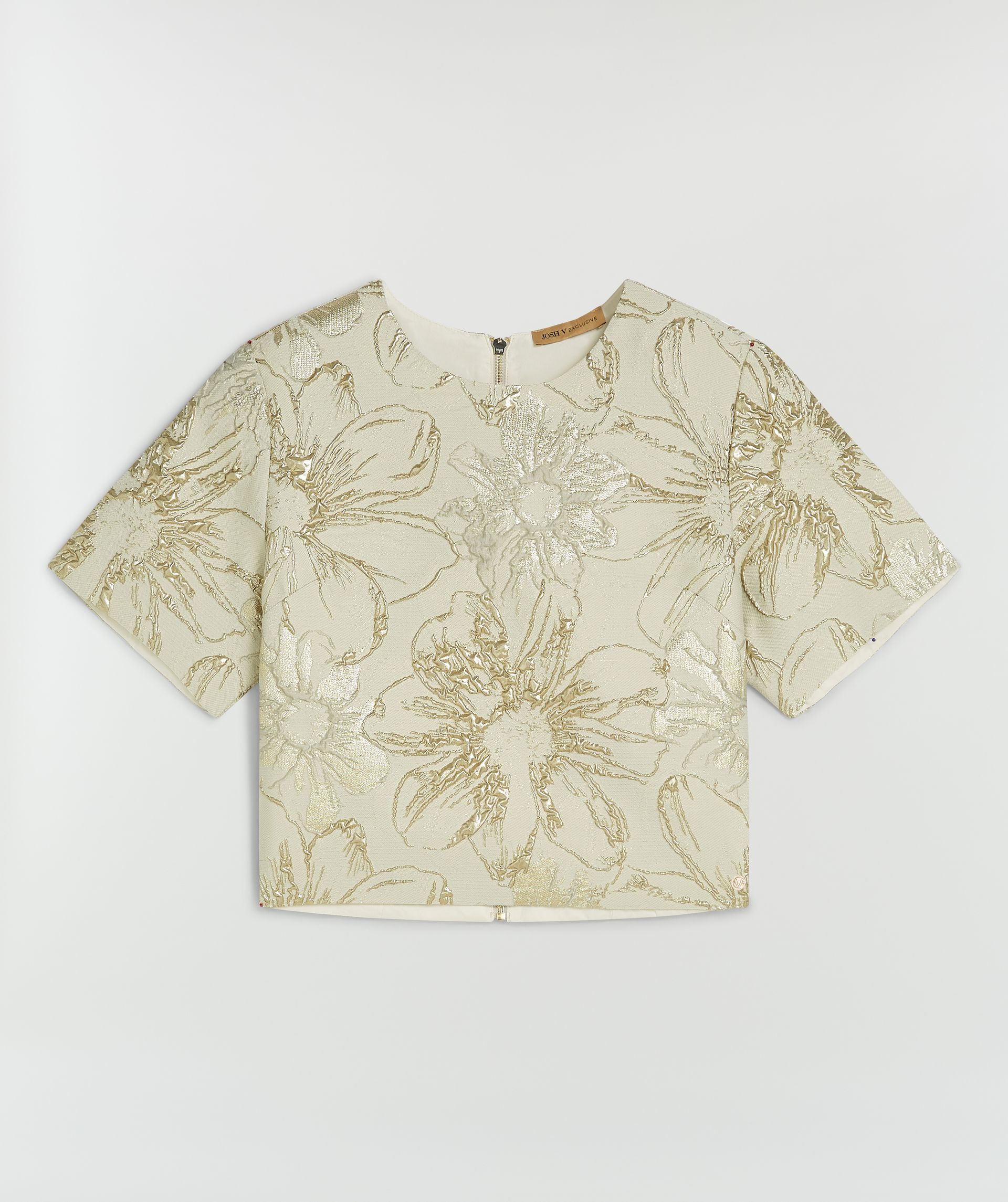 Cropped top met bloemen print zonder model, weergegeven op een lichtgrijze achtergrond 