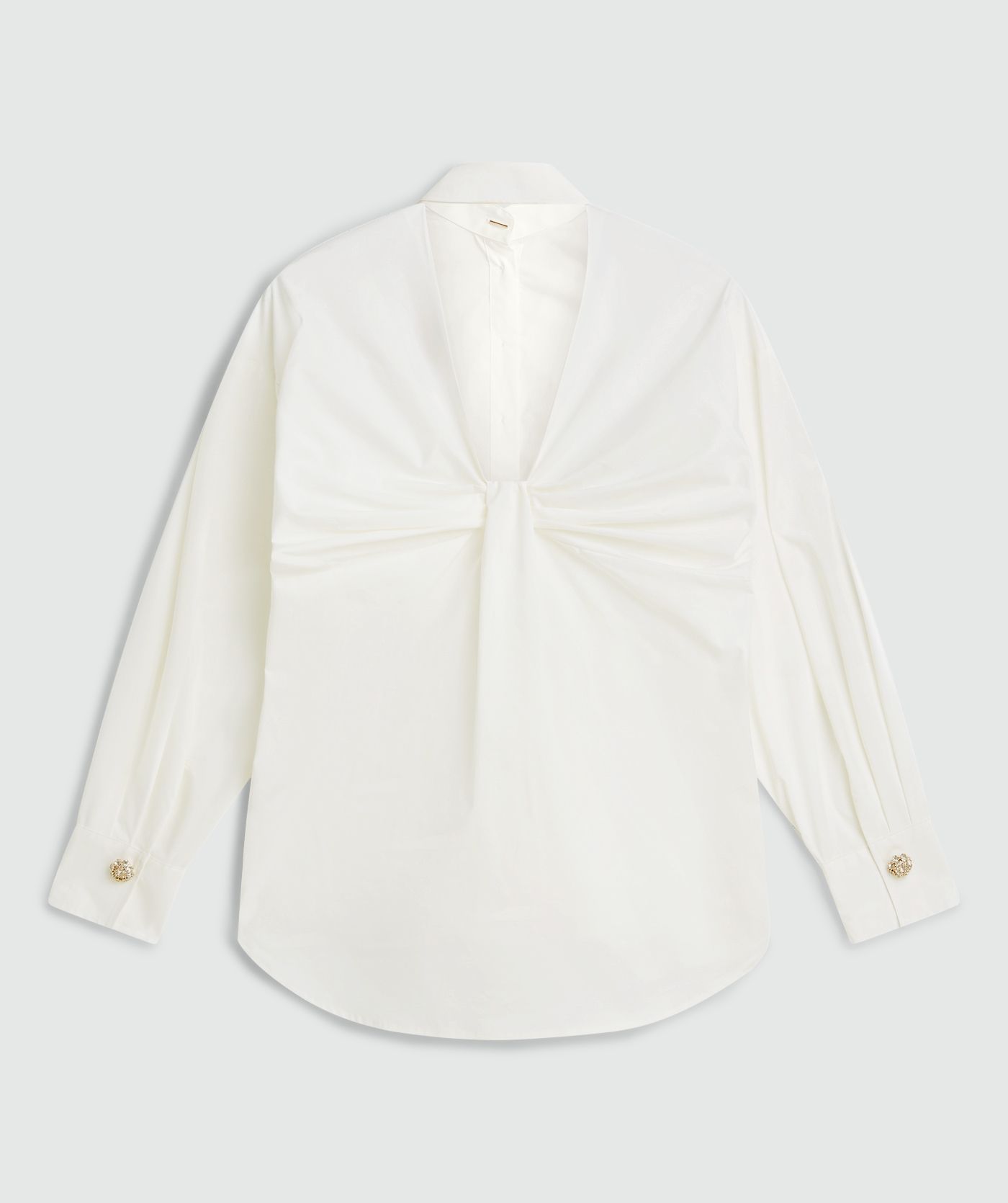 Off white blouse met open rug met strikdetail zonder model, weergegeven op een lichtgrijze achtergrond - JOSH V