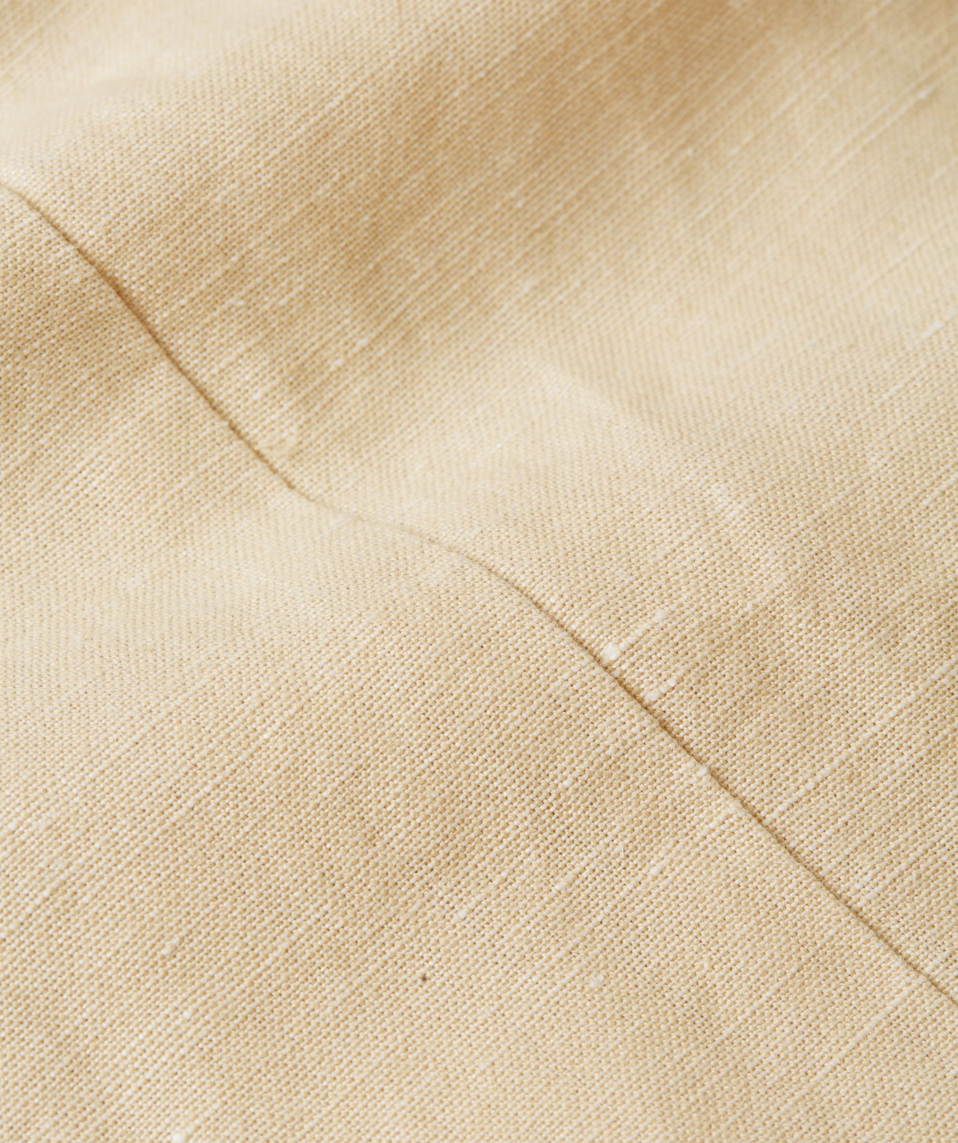 Close-up van de beige stof.
