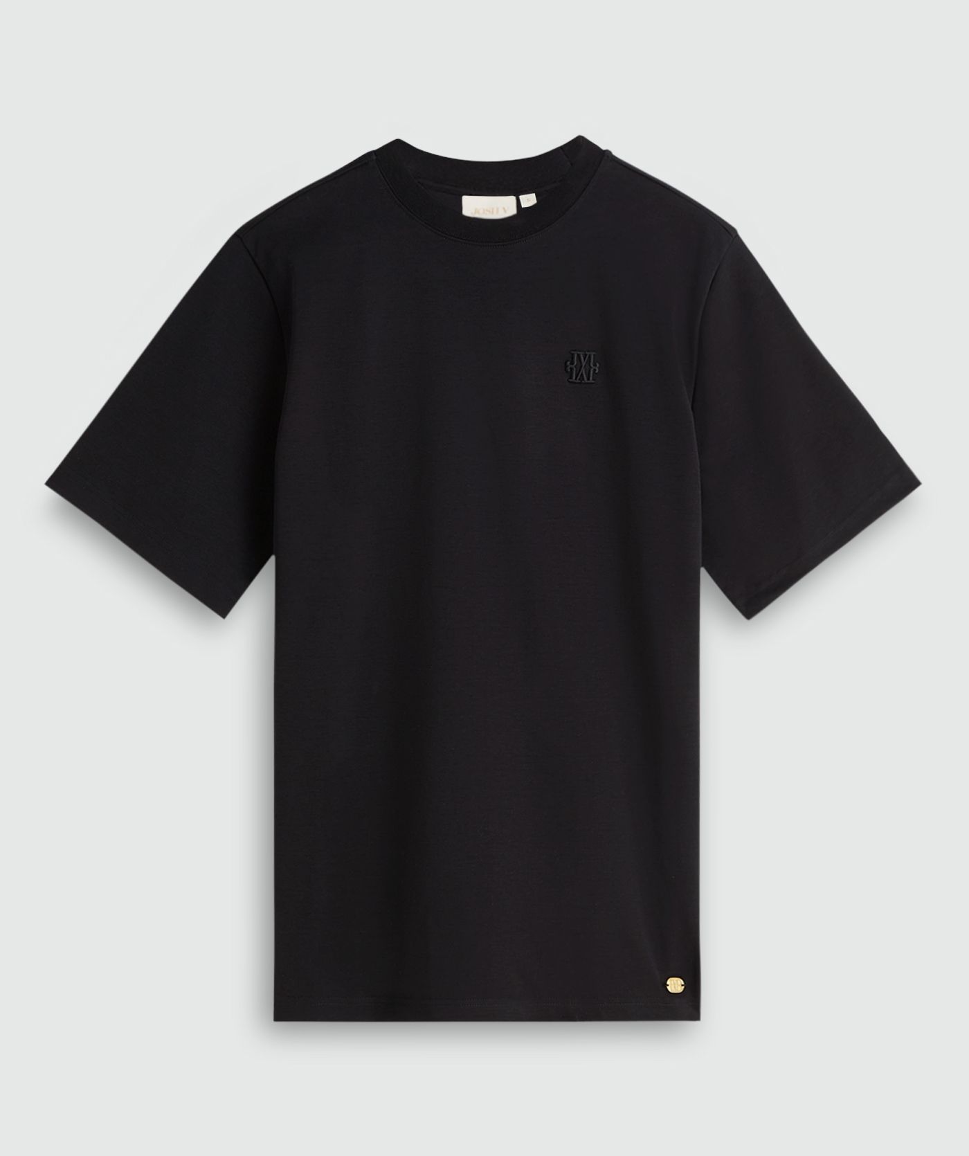 Oversized zwart T-shirt zonder model, weergegeven op een lichtgrijze achtergrond