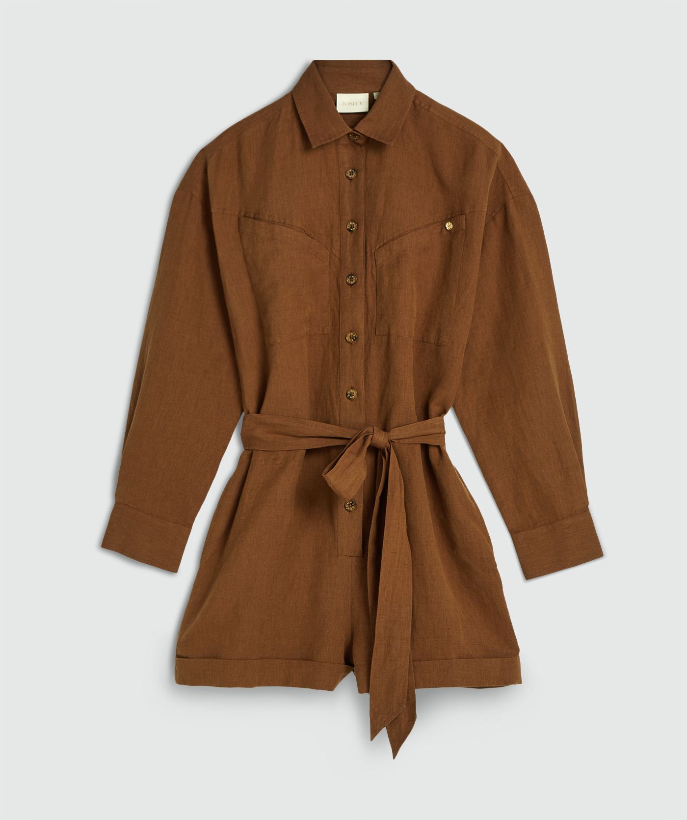 Een oversized playsuit in de kleur Brown, zonder model, weergegeven op een lichtgrijze achtergrond