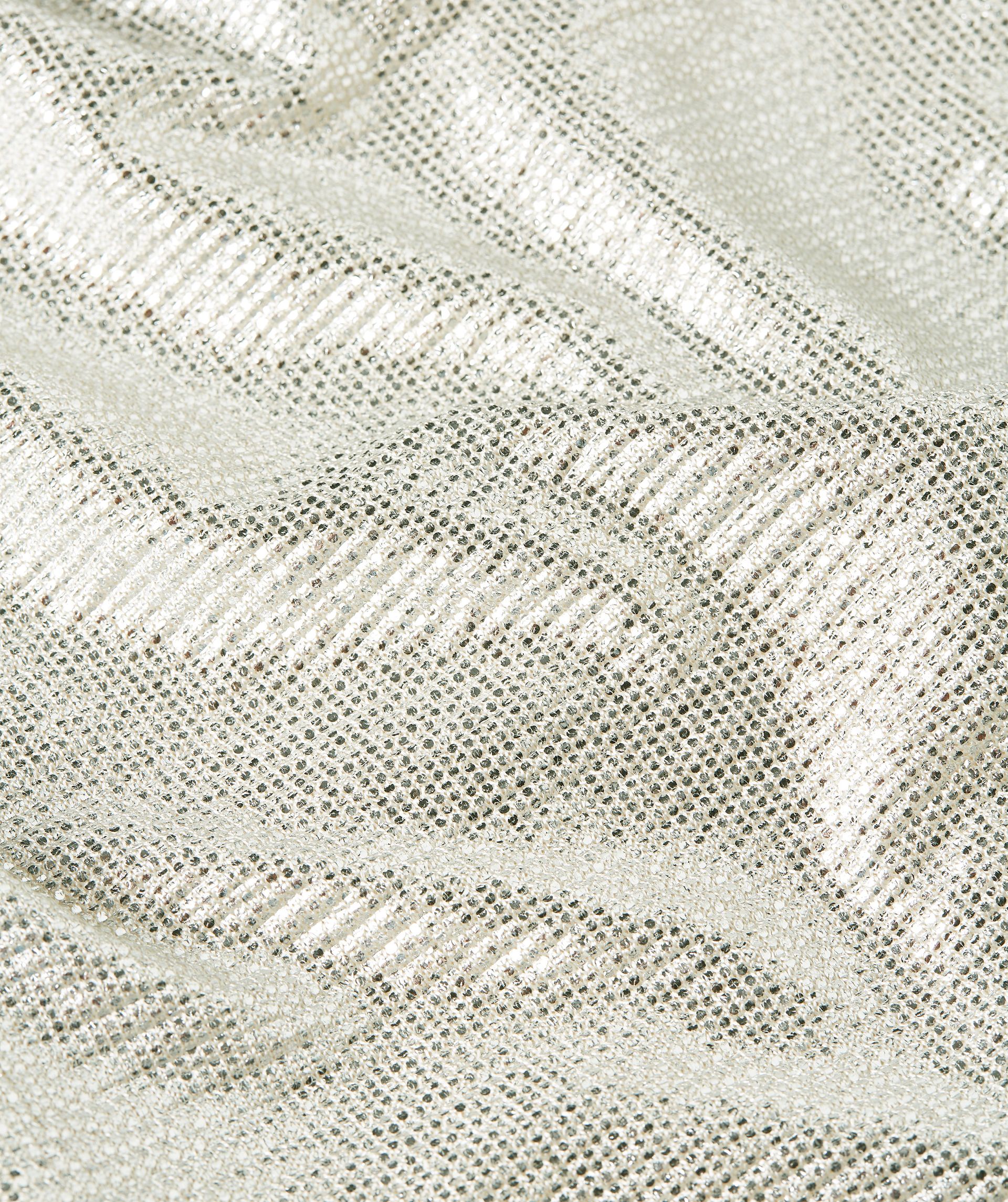 Close-up van de metallic zilverkleurige stof - Josh V.