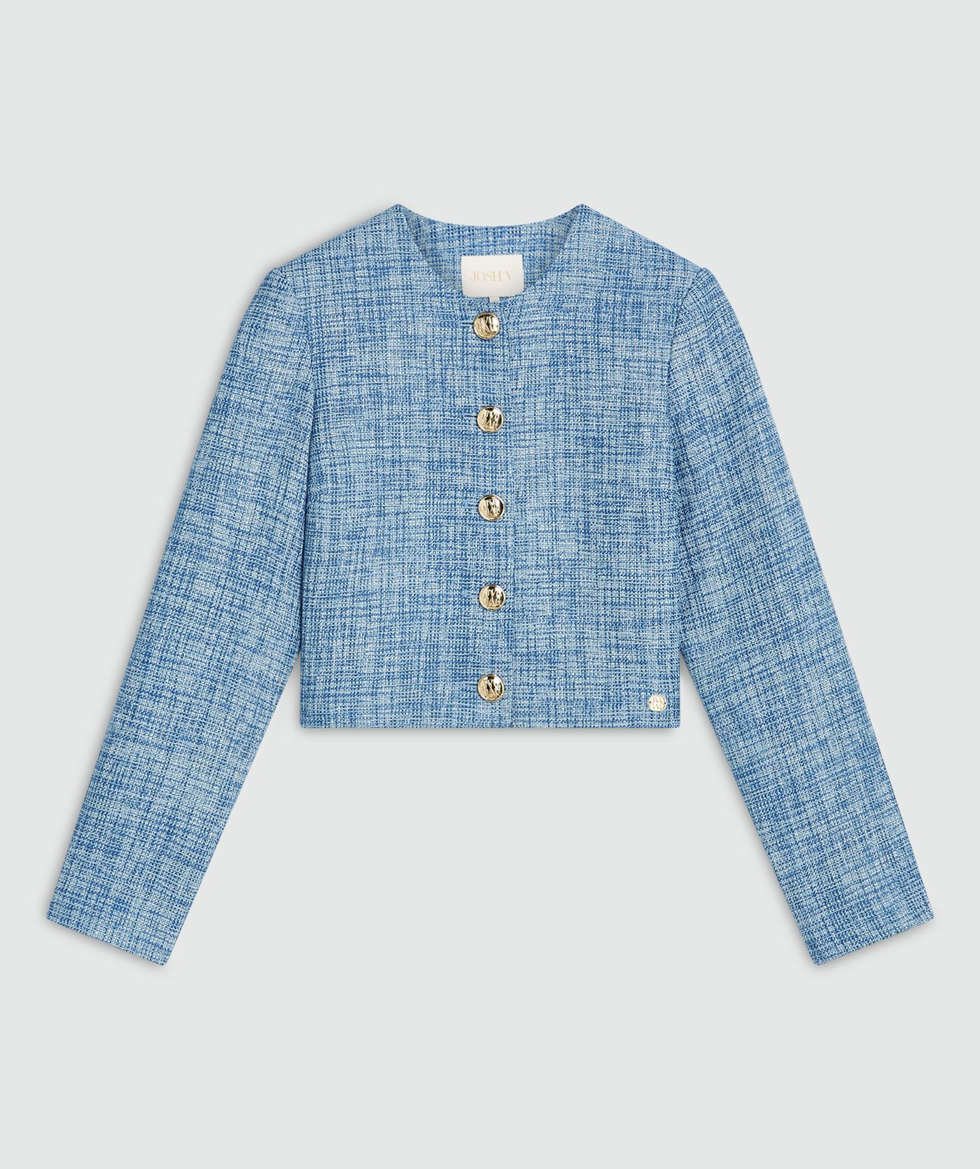 Een cropped blazer met lurex, uitgevoerd in de kleur Blue Bouclé, zonder model en weergegeven tegen een lichtgrijze achtergrond