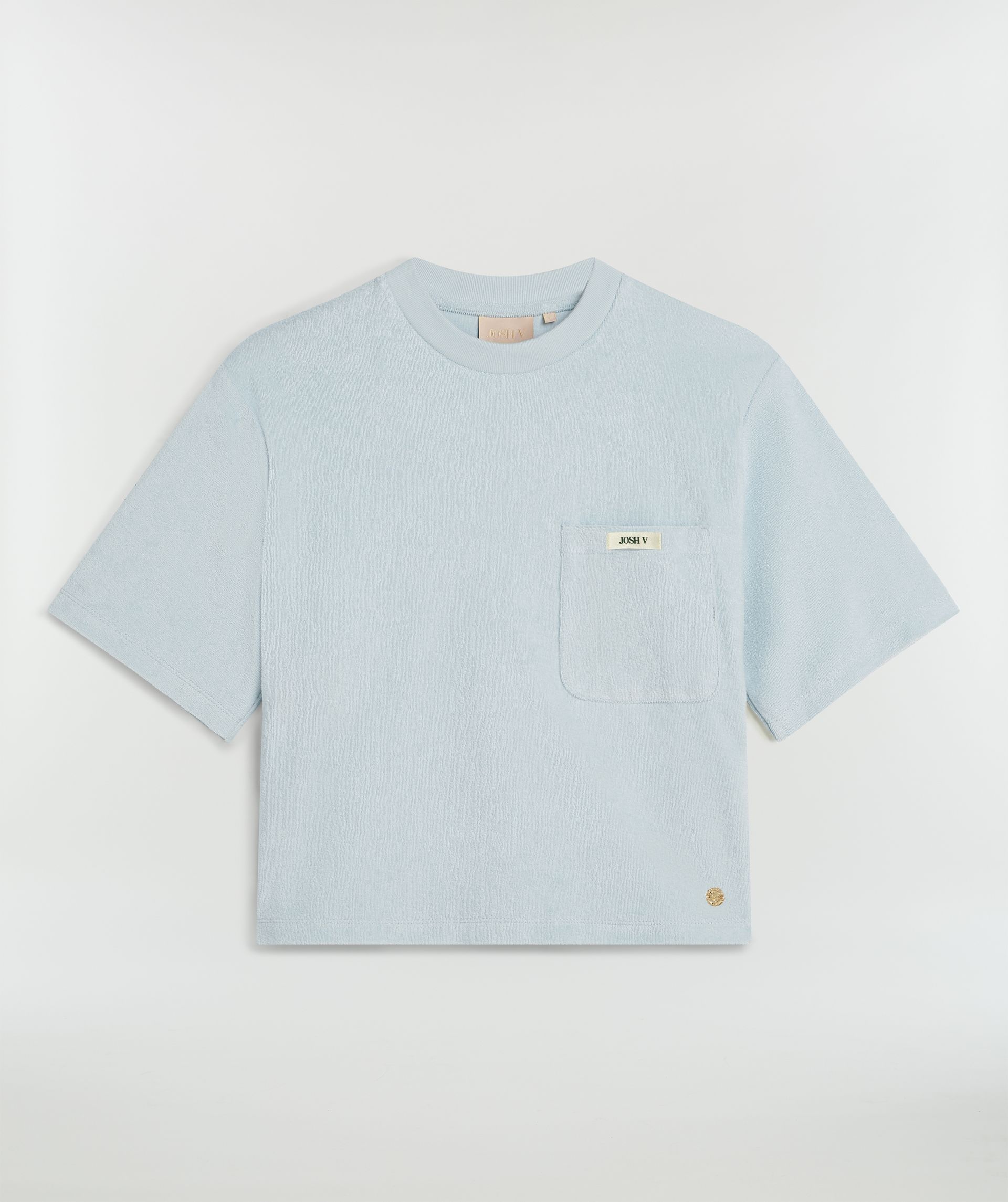 Lichtblauwe oversized T-shirt zonder model, weergegeven op een lichtgrijze achtergrond - Josh V