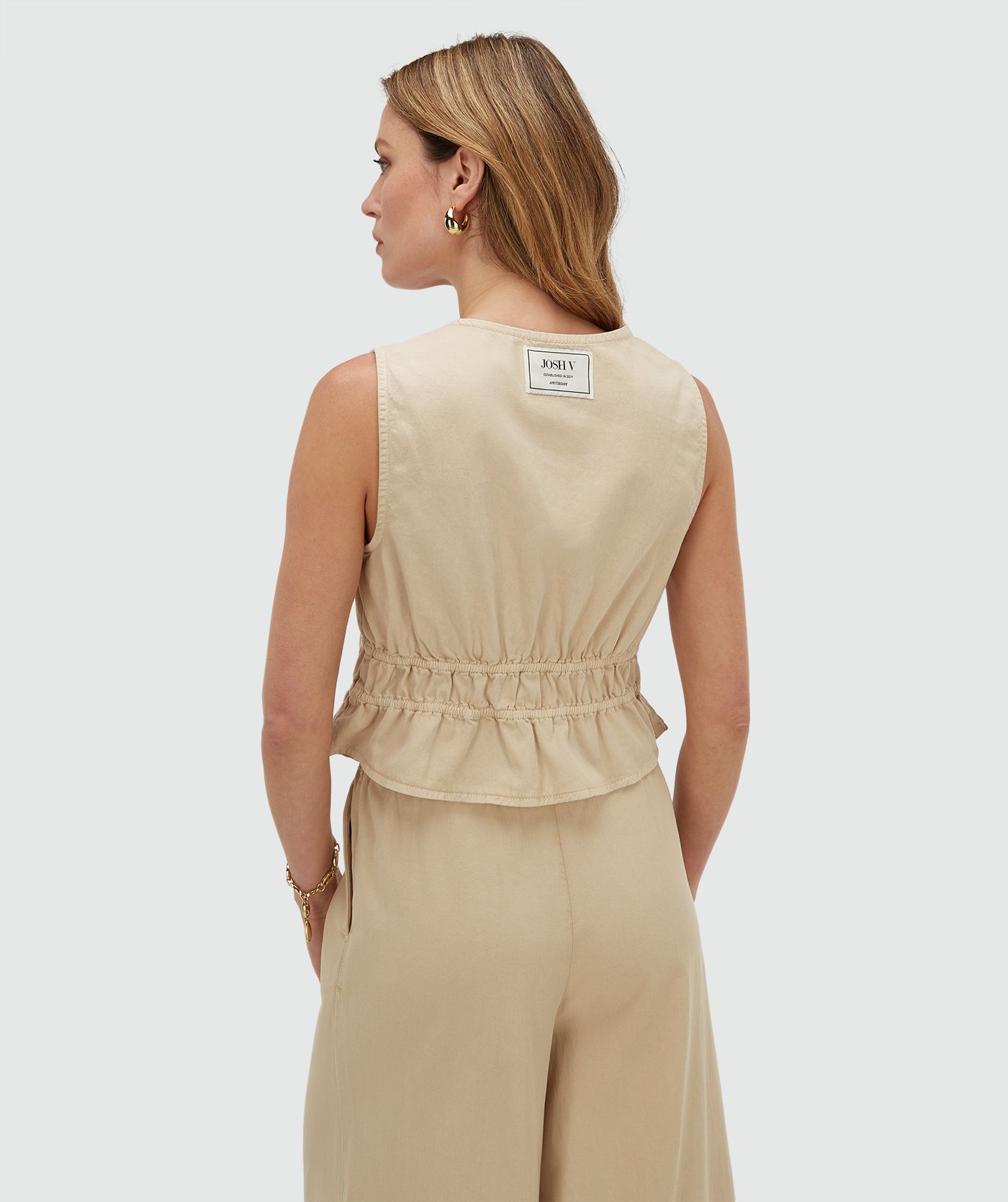JV-SEA tailliertes Peplum-Top