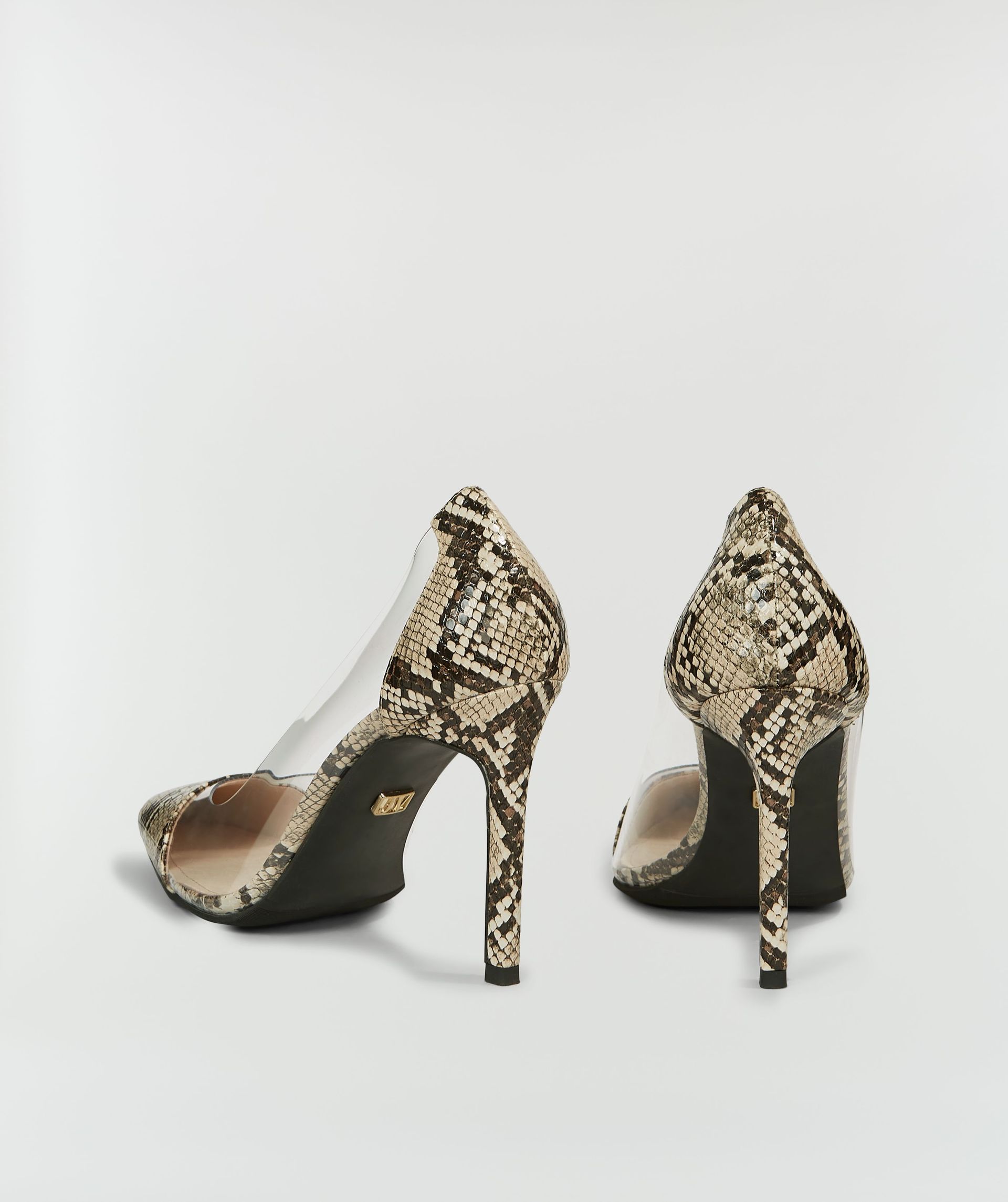 ZYRA pumps with snake print