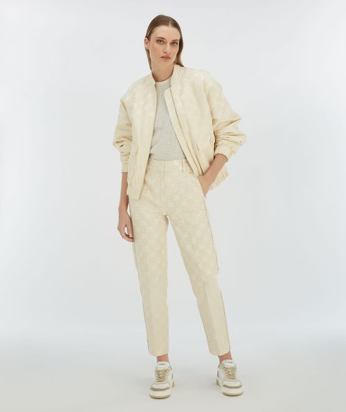 NIKITA figurbetonte Hose mit Logoprint